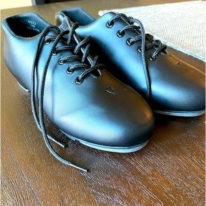 Size 3 tap shoe, new worn for 1 class. Too small, fits more like a size 2.5 .